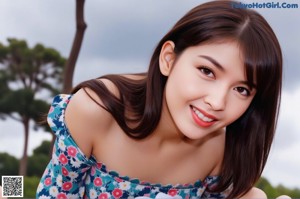 A naked asian woman sitting on a couch with her legs crossed.