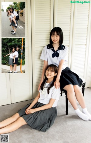 Two young women in school uniforms posing for a picture.