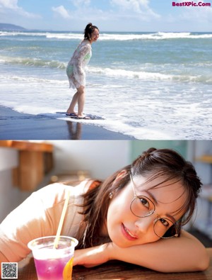 A woman laying on a bed in a white sweater.