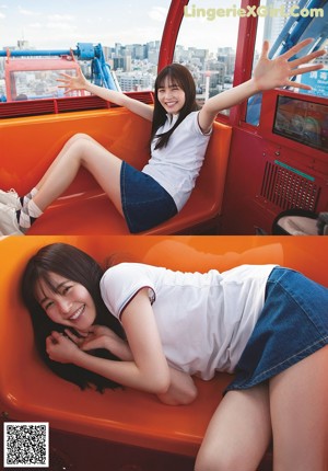 A young woman in a school uniform posing for a picture.
